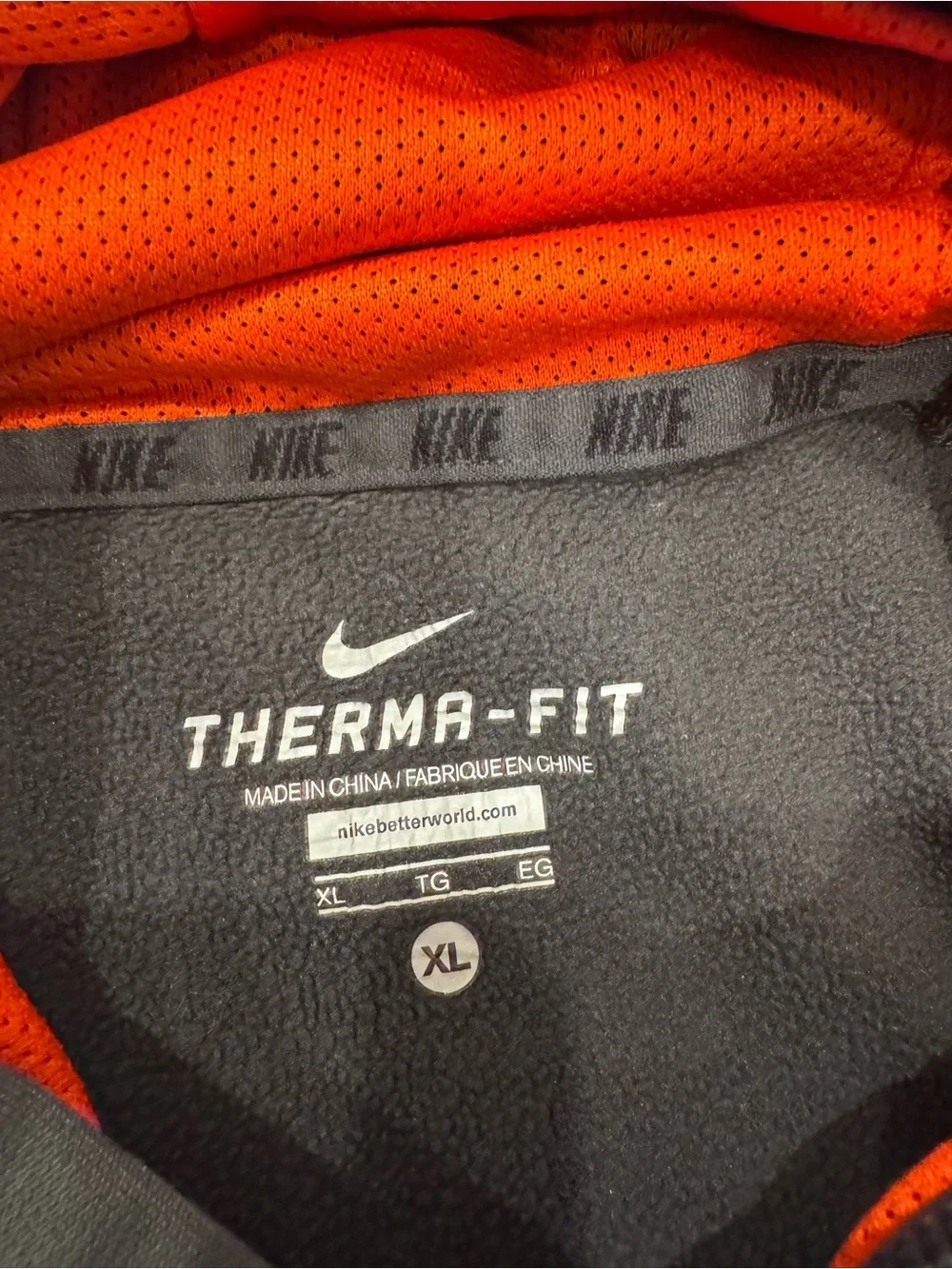 Nike Therma-Fit Hoodie in Black with Bright Orange Lining
